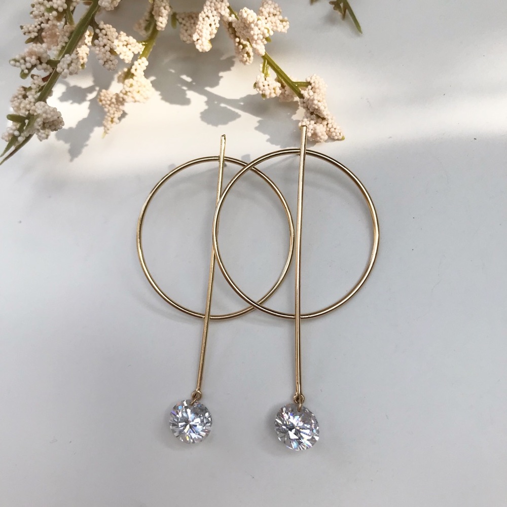 Geo style earrings with drop diamond
